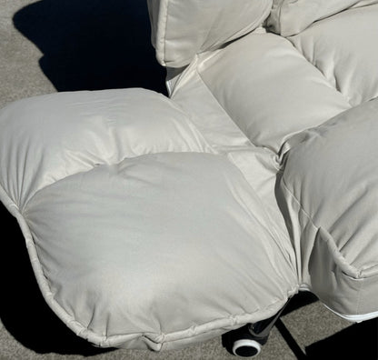Close-up of the ERGOWAVE L1 light grey fabric upholstery and stitched seam